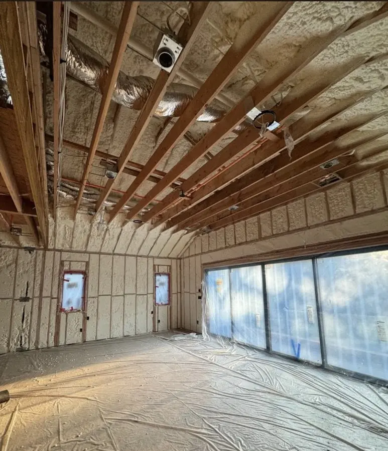 Interior walls and ceiling insulated with spray foam during new construction in Sparta